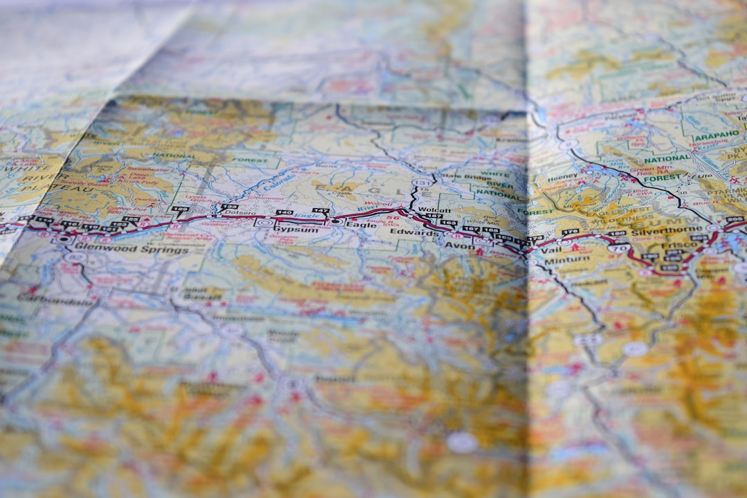 Solo traveller studying a route map