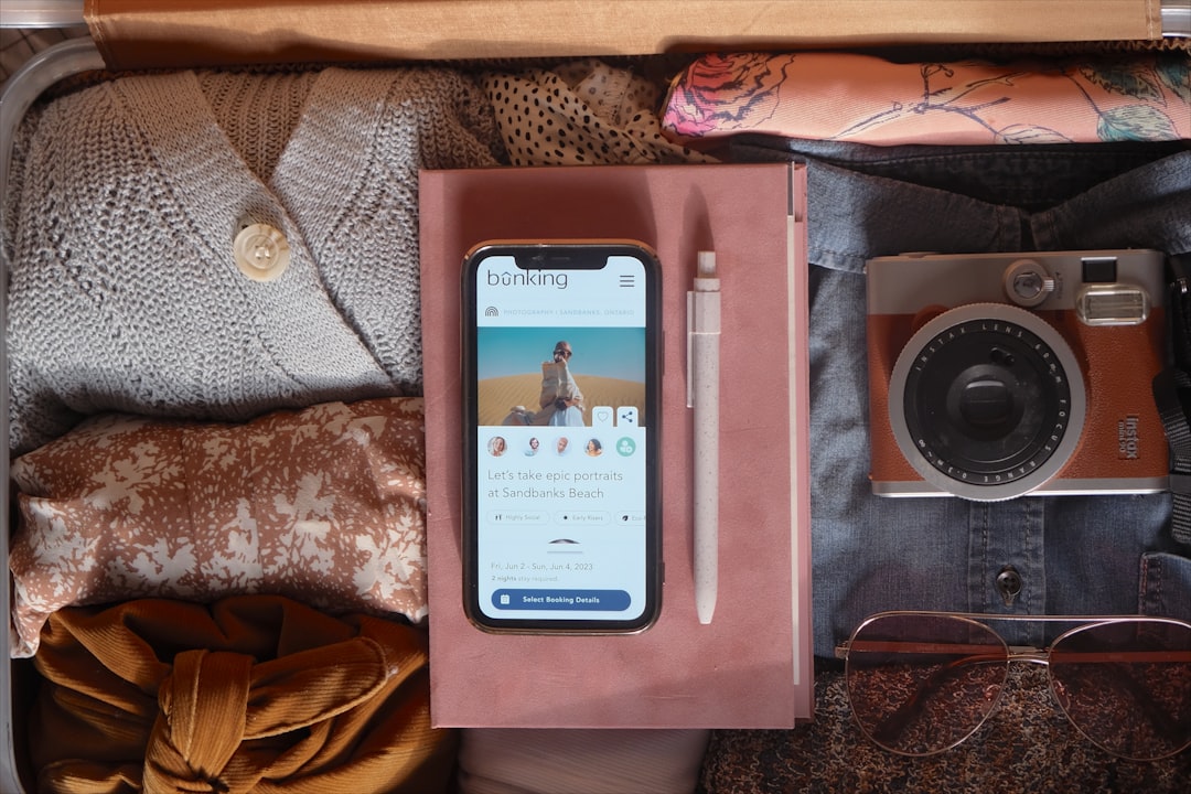 Traveler checking flight information on phone